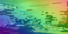 Decorative image of a classroom with shifting pixels