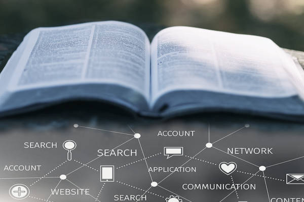 Decorative image of a book above a network of data related connections