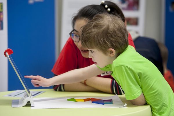 Child uses an iPad